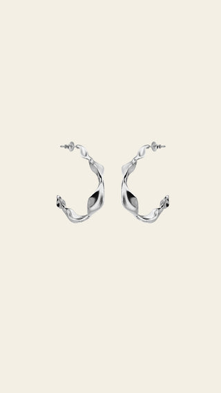Lumoava Studio Wild Thing korvakorut, rodinoitua pronssia