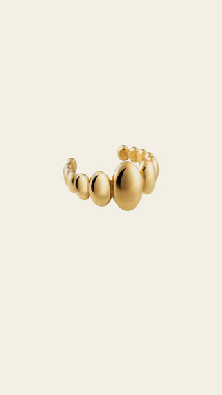 Lumoava Studio Pebble Buddy sormus, keltakullattua pronssia